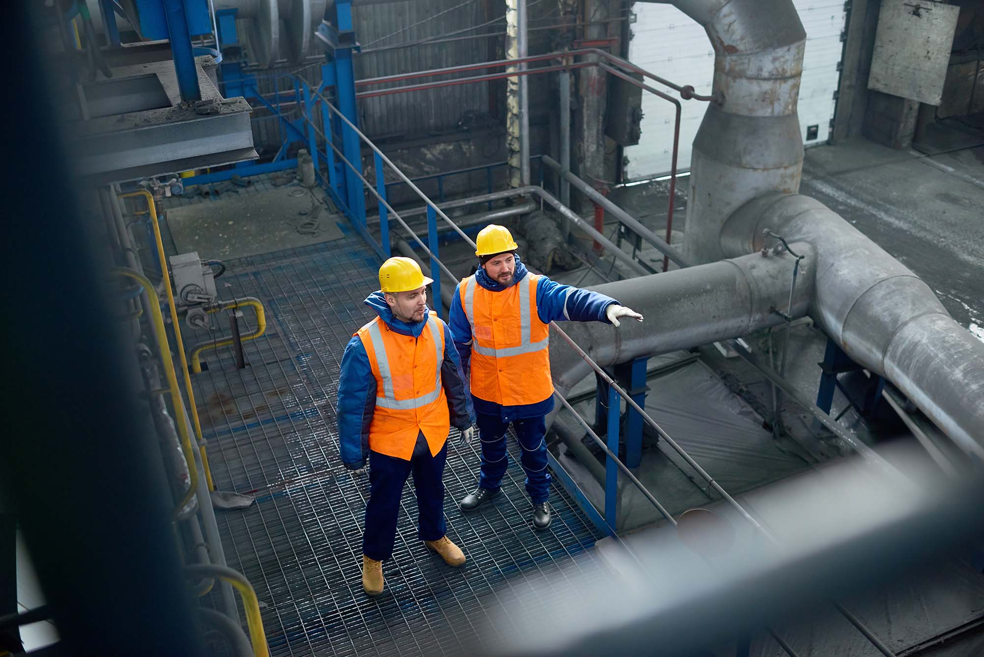 engineers-inspecting-an-industrial-site-with-pipel